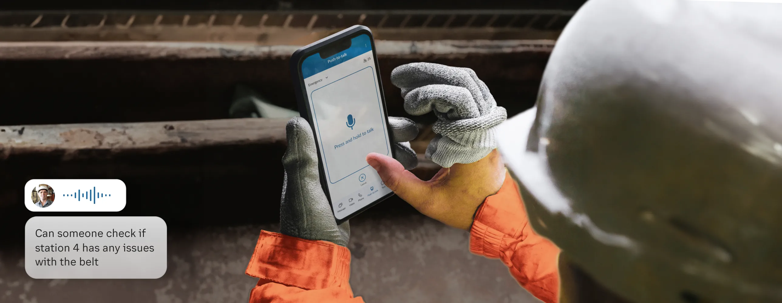 A worker uses the Push to Talk feature of the RingCentral app on a mobile phone