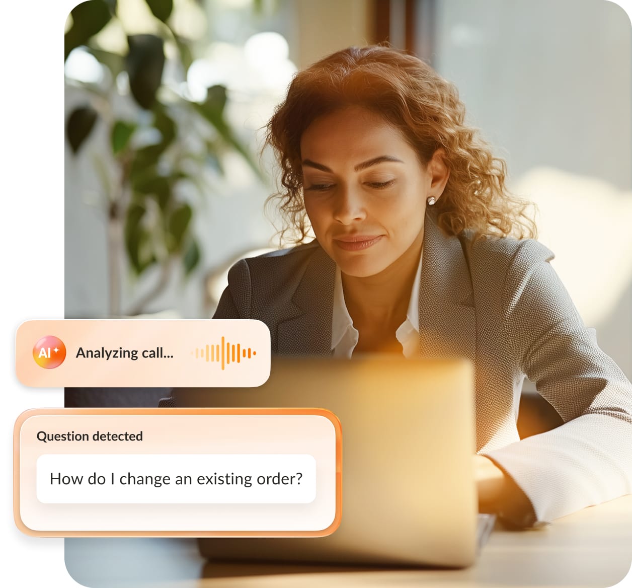 The RingCentral RingCX AI assist in use by a woman working on a laptop at home
