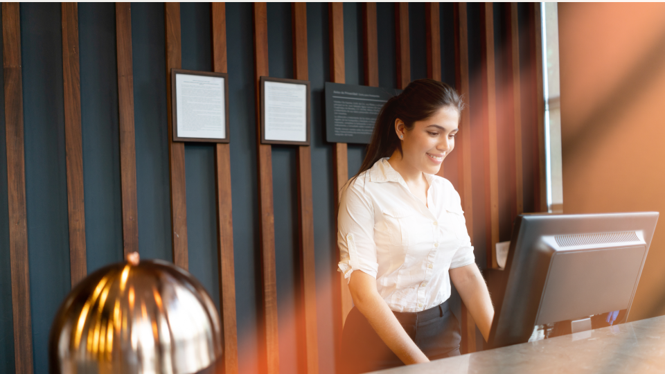 Staff at a retain store reviewing orders on desktop