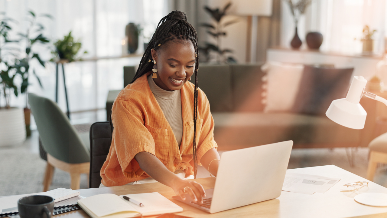 Woman on laptop working with customer representative