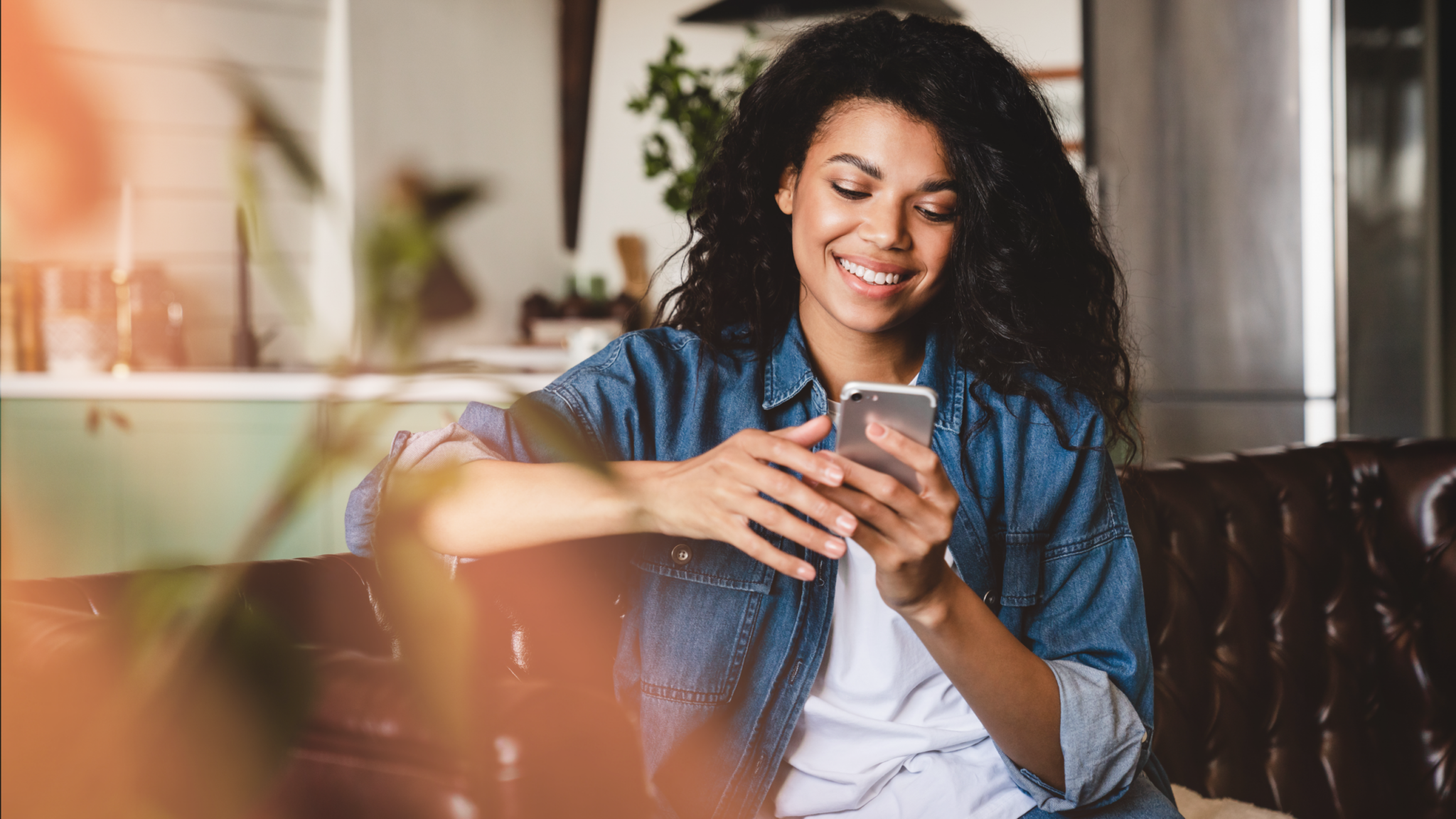 Woman on phone texting SMS