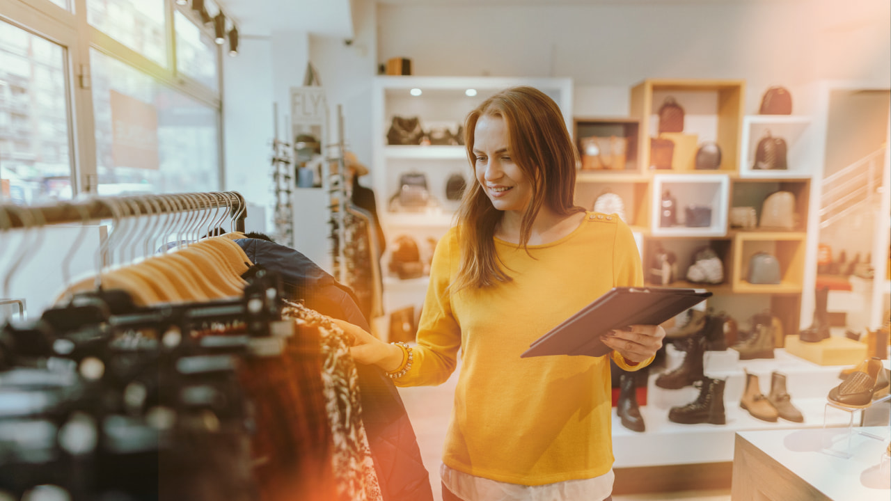 Retail business owner checking store inventory