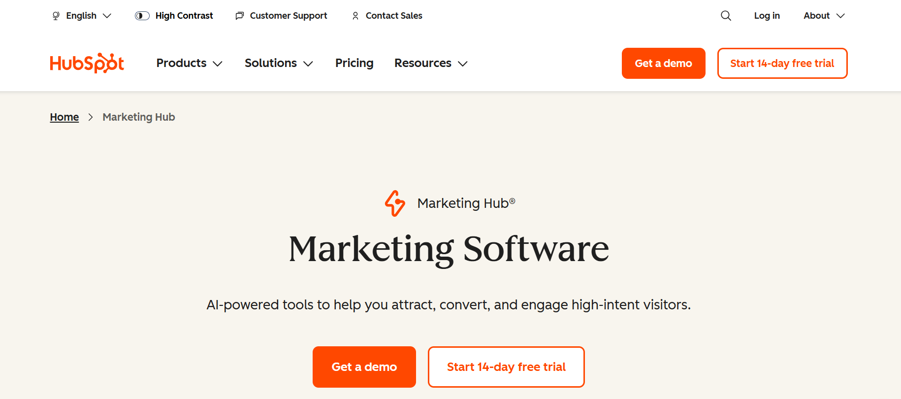 HubSpot Marketing Hub homepage with a cream background and the tagline “Marketing Software” followed by a description of AI-powered tools.
