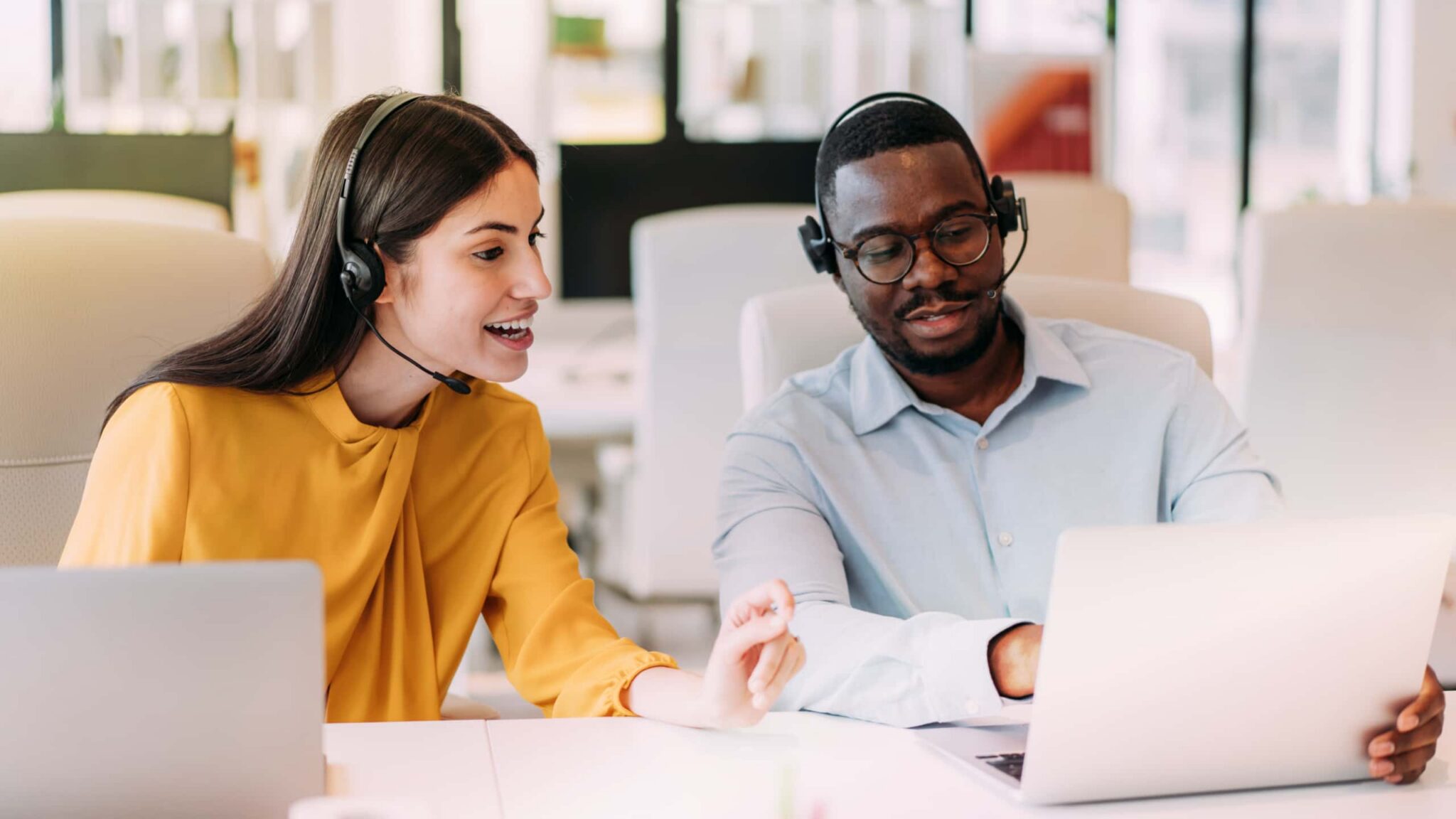 contact center supervisor using RingCentral AI Quality Management to personalize coaching plans for agents